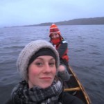 Two young women canoeing